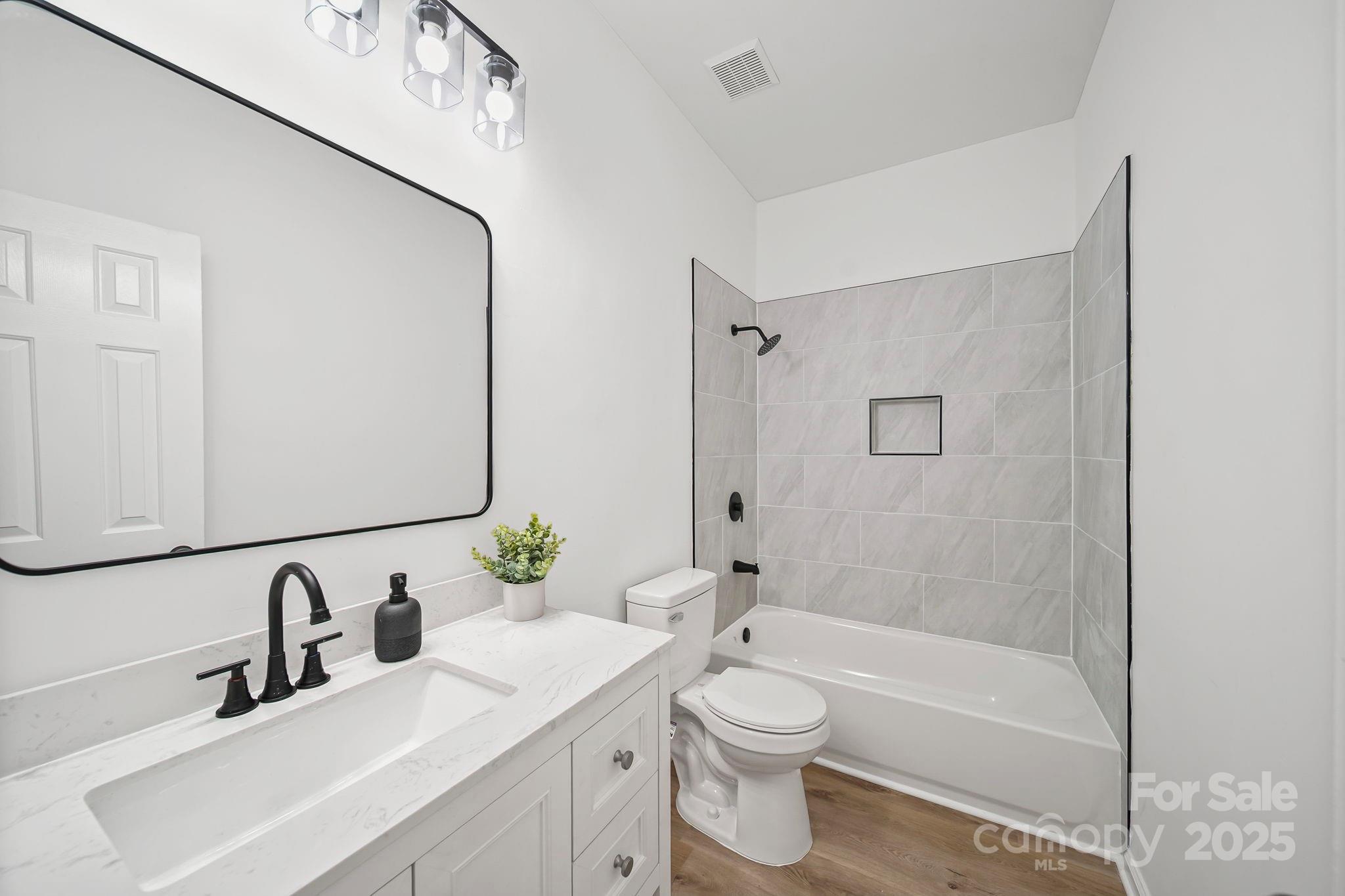 2120 Crosstrail Ridge Rock Hill, SC 29732 - Photo 10 of 12 a bathroom with a sink a toilet and shower
