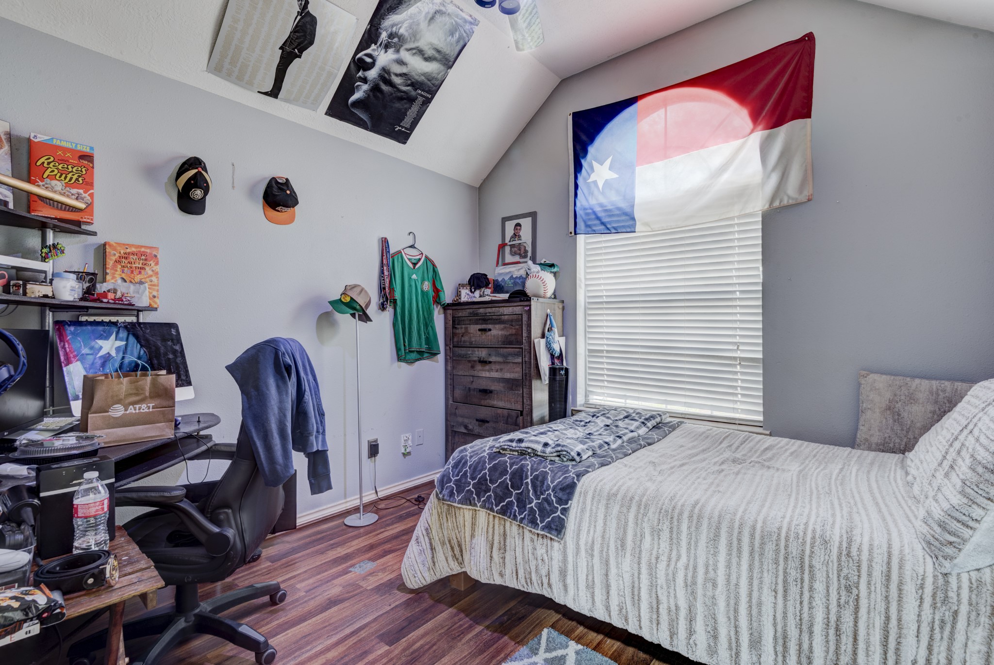 6723 Greenhouse Road Katy, TX 77449 - Photo 11 of 15 a bedroom with a bed and a desk