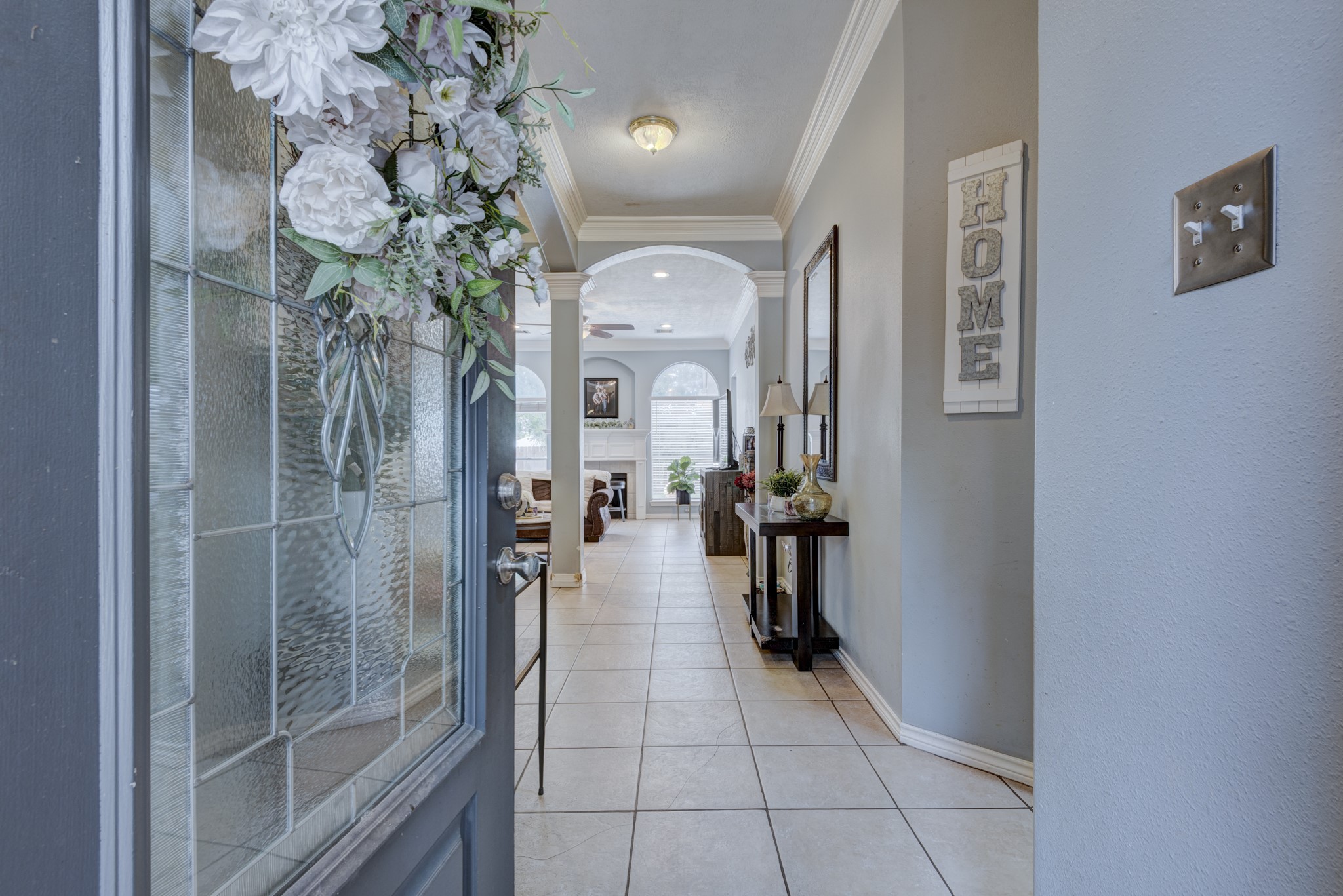 6723 Greenhouse Road Katy, TX 77449 - Photo 3 of 15 a view of a hallway and a livingroom with furniture