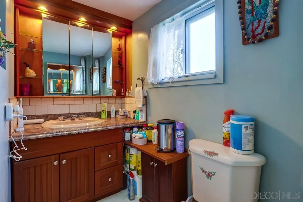 17745 Highway 67 Ramona, CA 92065 - Photo 9 of 24 a kitchen with a sink cabinets and a window