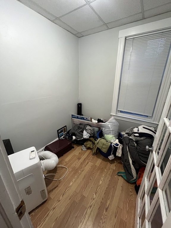 63 Marshfield Street, Unit 1 Boston, MA 02119 - Photo 11 of 26 a room with gym equipment