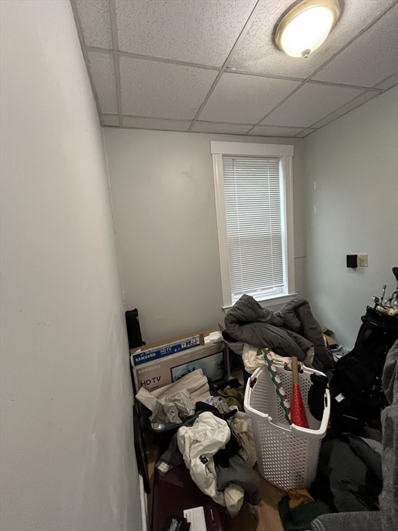 63 Marshfield Street, Unit 1 Boston, MA 02119 - Photo 13 of 26 a room with furniture and air conditioner