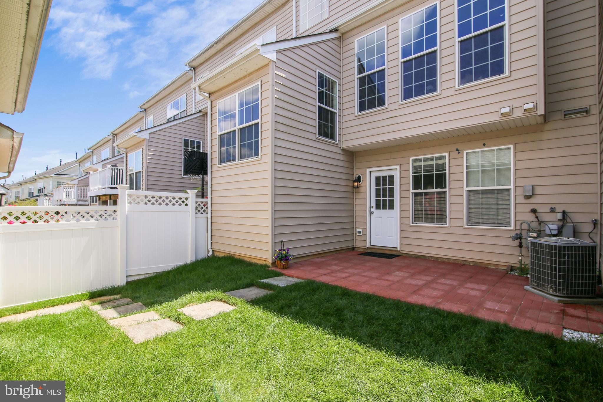 23027 Birch Mead Road Clarksburg, MD 20871 - Photo 52 of 71 Exterior view of Backyard Patio and Lawn