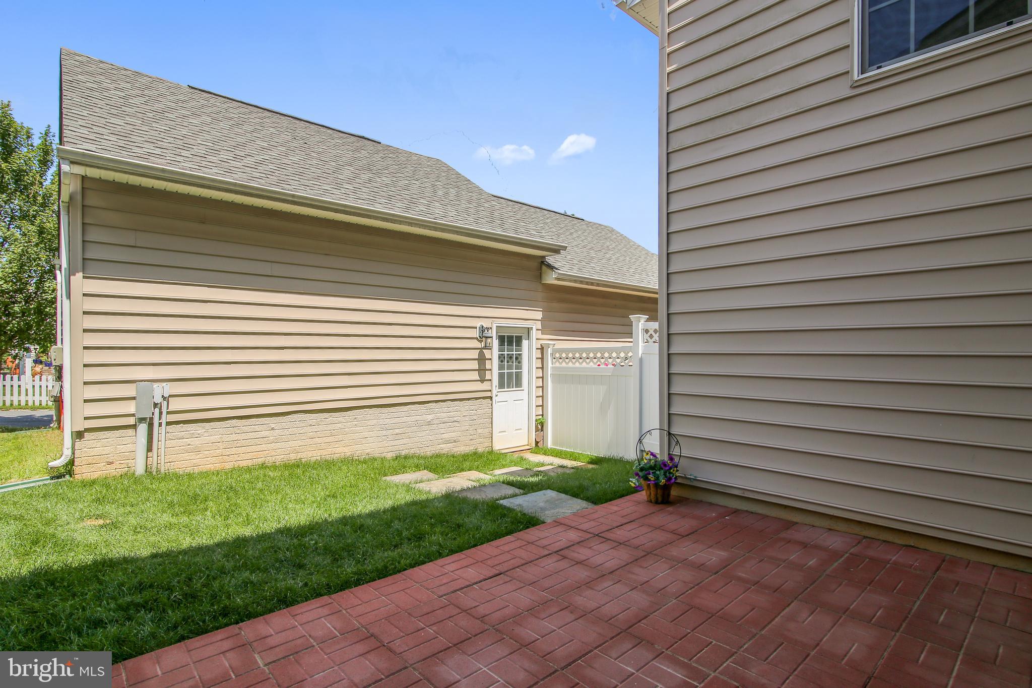 23027 Birch Mead Road Clarksburg, MD 20871 - Photo 53 of 71 Exterior view of Backyard Patio and Lawn