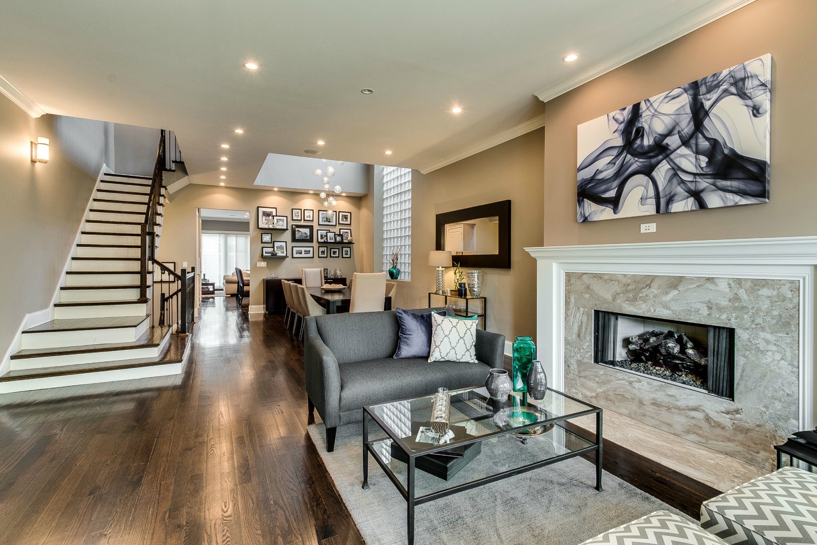 1844 West Huron Street Chicago, IL 60622 - Photo 2 of 34 a living room with furniture and a fireplace