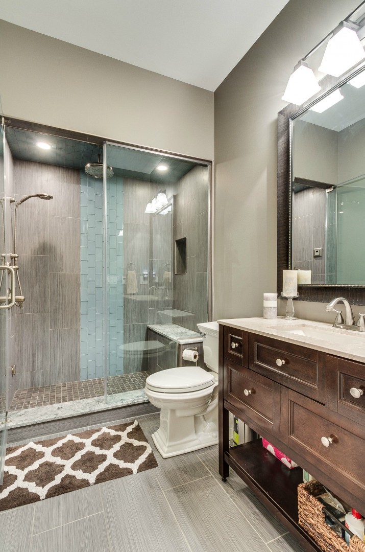 1844 West Huron Street Chicago, IL 60622 - Photo 23 of 34 a bathroom with a sink double vanity and a mirror