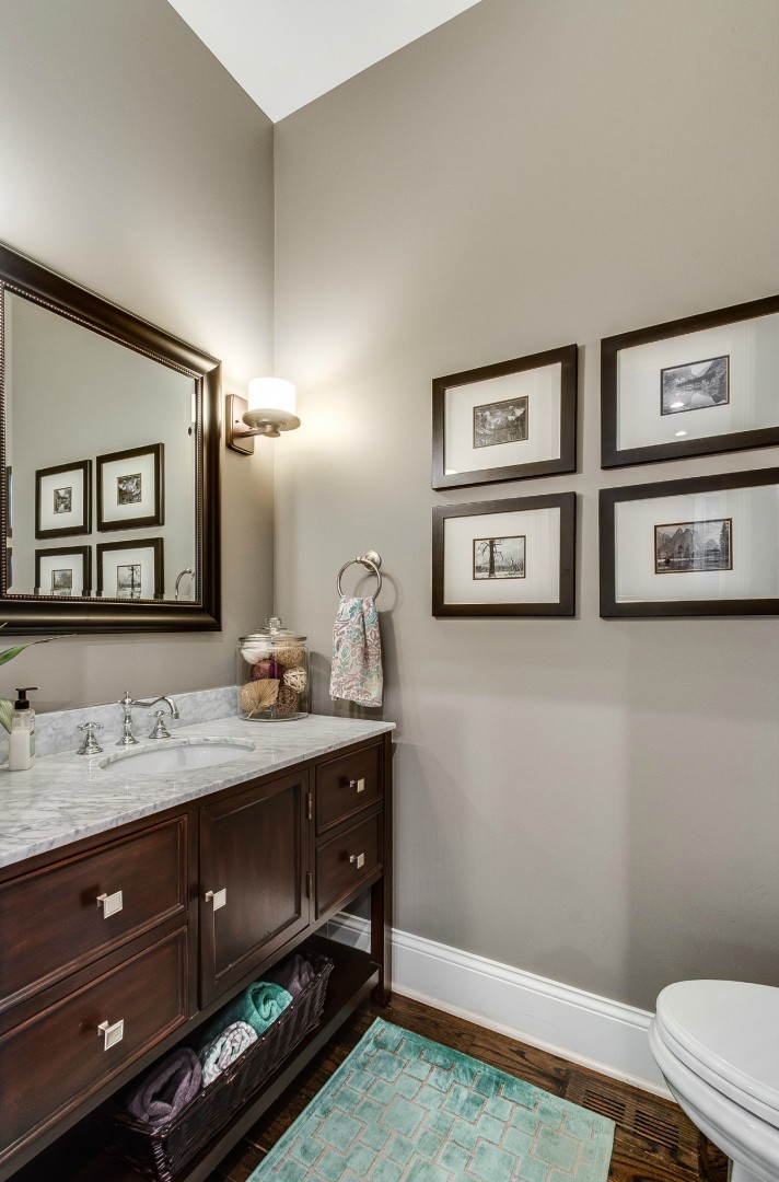 1844 West Huron Street Chicago, IL 60622 - Photo 9 of 34 a bathroom with double vanity sink and a mirror