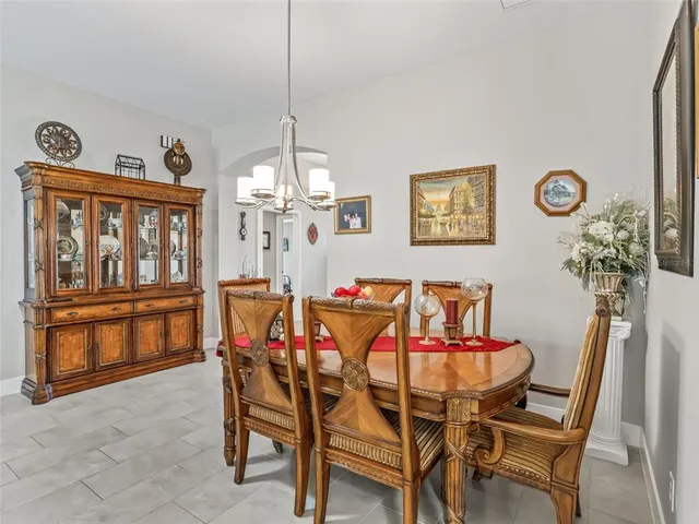 a living room with furniture rug and window
