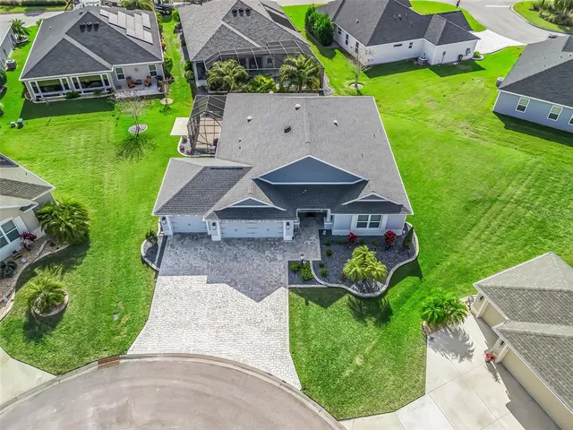 an aerial view of a house with garden