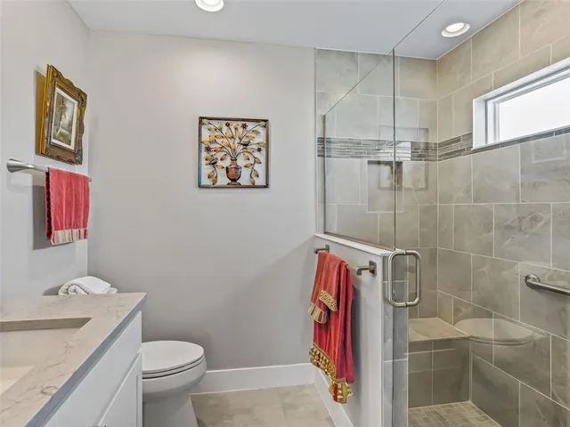 a view of an entryway with flower pots