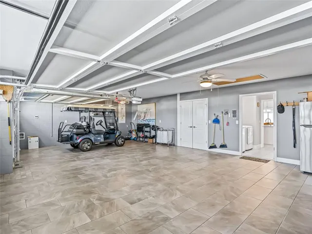 a view of residential houses with outdoor space and ocean view