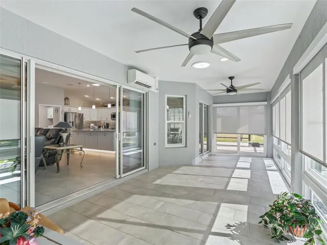 an aerial view of a residential houses with outdoor space