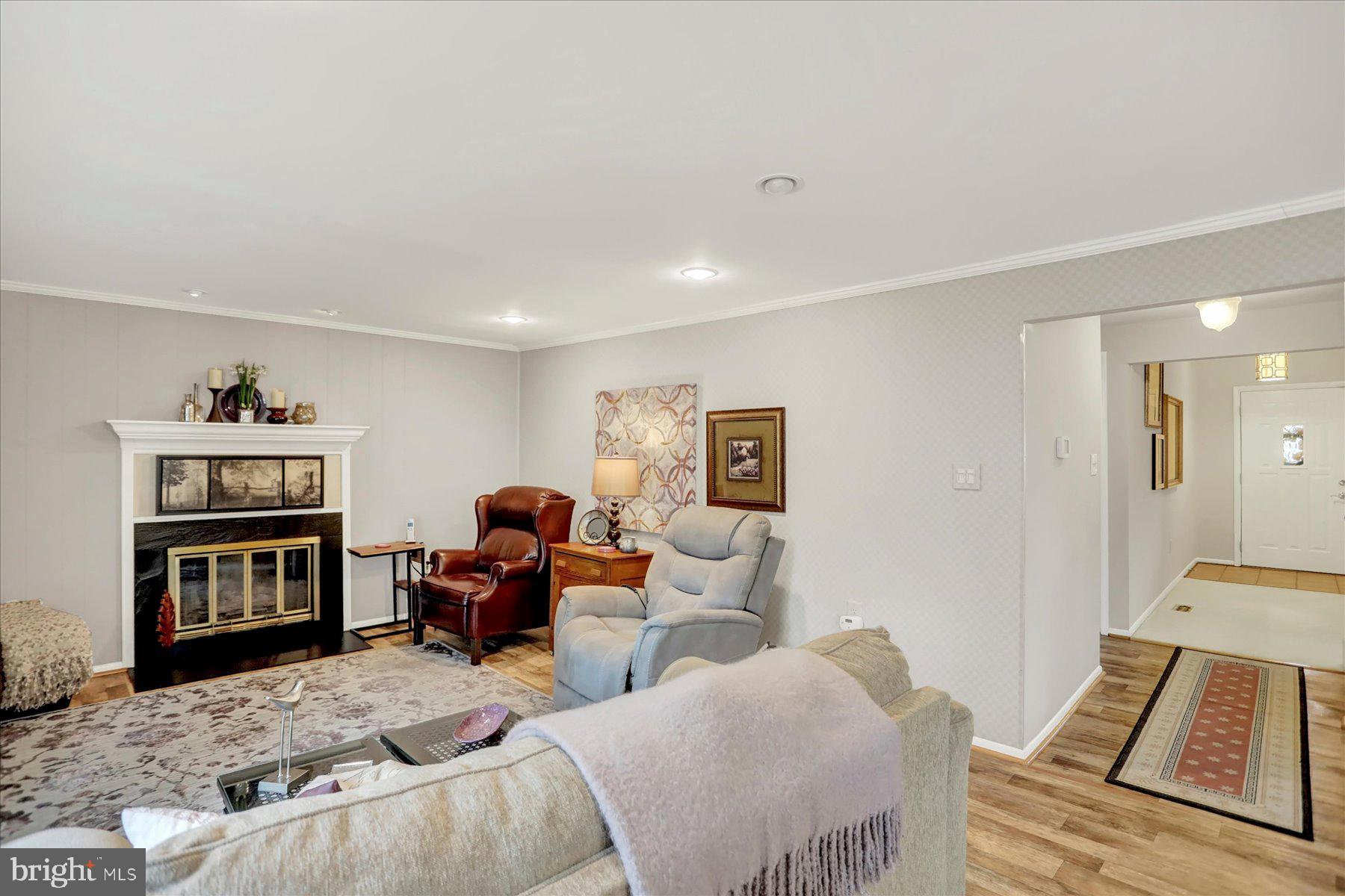 9228 Bowline Road Baltimore, MD 21236 - Photo 17 of 48 a living room with furniture and a couch