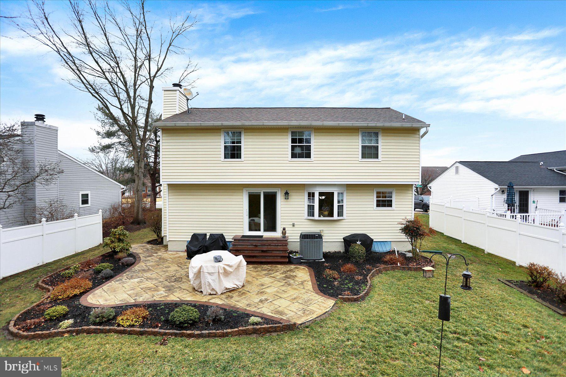 9228 Bowline Road Baltimore, MD 21236 - Photo 42 of 48 a view of a house with backyard water and a patio