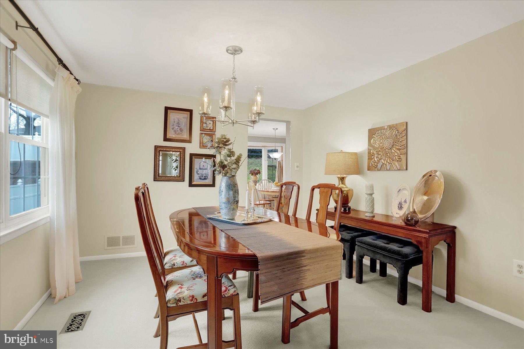9228 Bowline Road Baltimore, MD 21236 - Photo 9 of 48 a view of a dining room with furniture