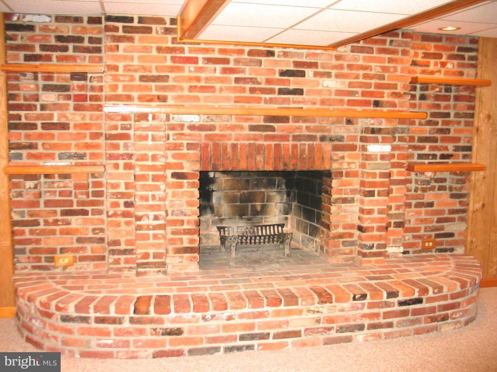 841 Evergreen Road Severn, MD 21144 - Photo 13 of 26 a view of a fireplace