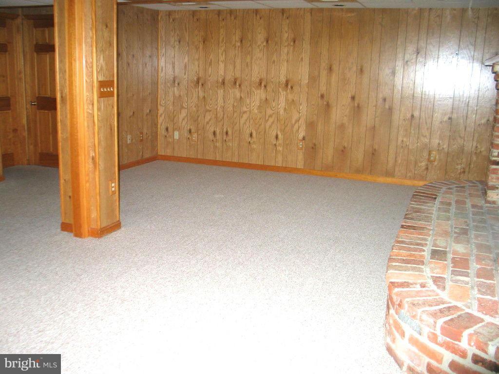 841 Evergreen Road Severn, MD 21144 - Photo 16 of 26 an empty room with windows