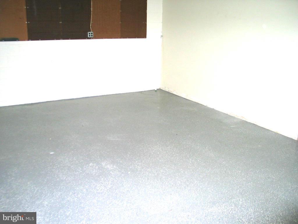 841 Evergreen Road Severn, MD 21144 - Photo 21 of 26 a view of wooden floor and a rug