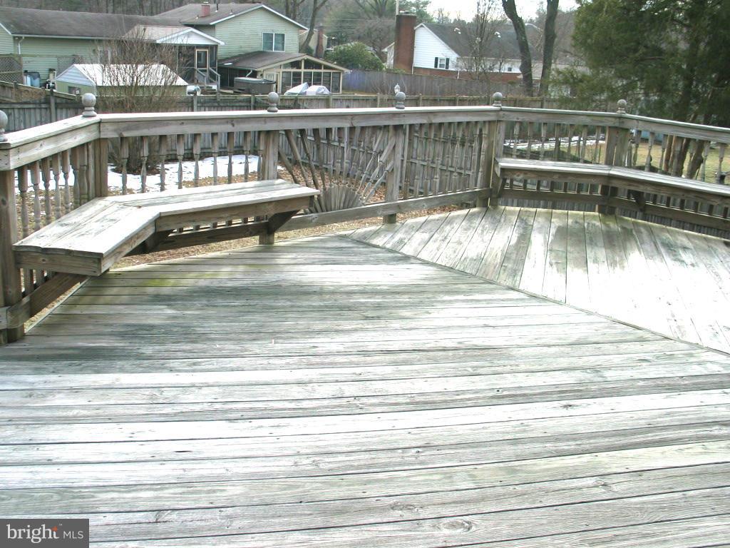 841 Evergreen Road Severn, MD 21144 - Photo 24 of 26 a view of a balcony with wooden floor