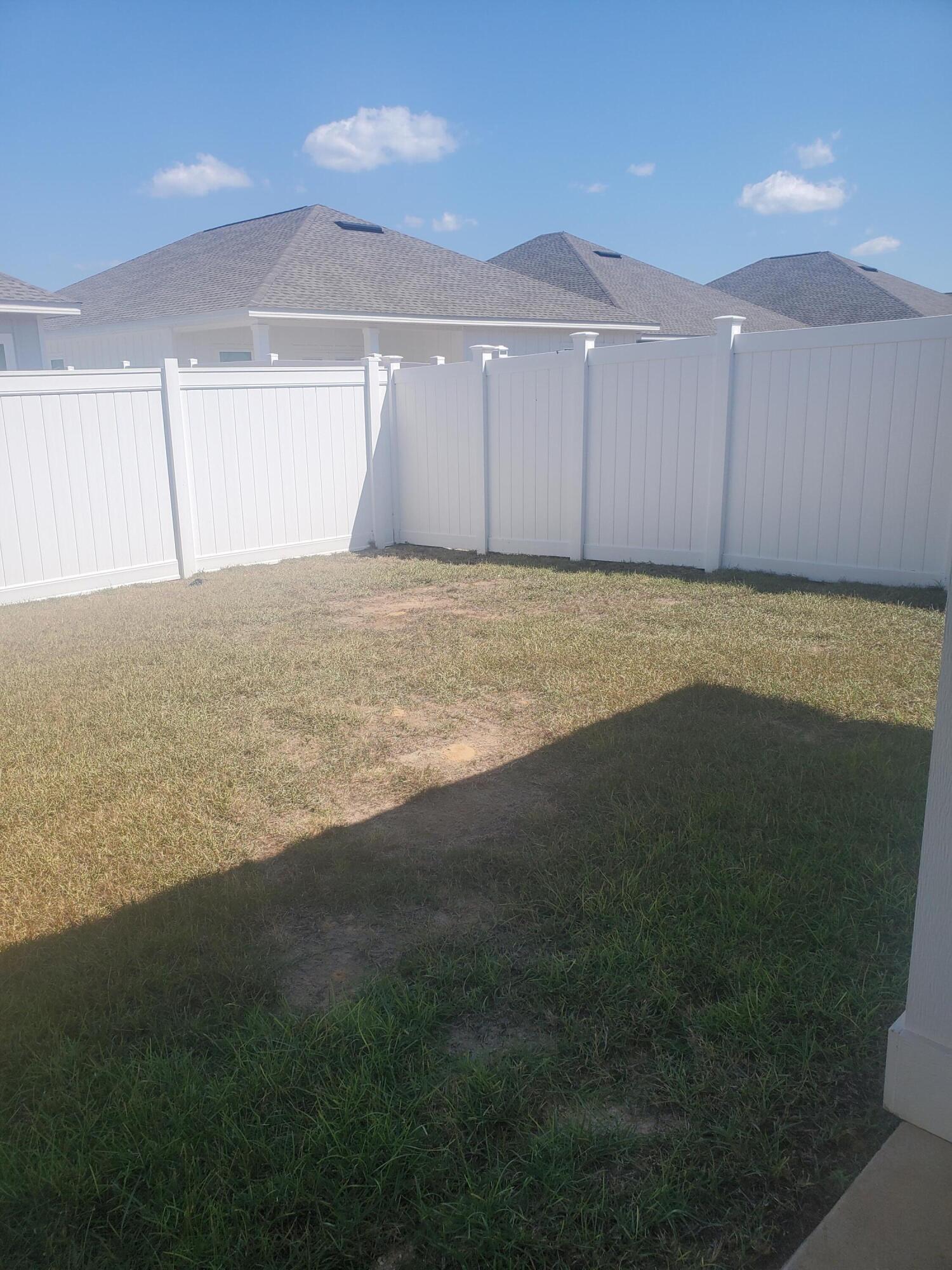 157 Blooming Cove Crestview, FL 32539 - Photo 13 of 14 a view of an empty room and kitchen space
