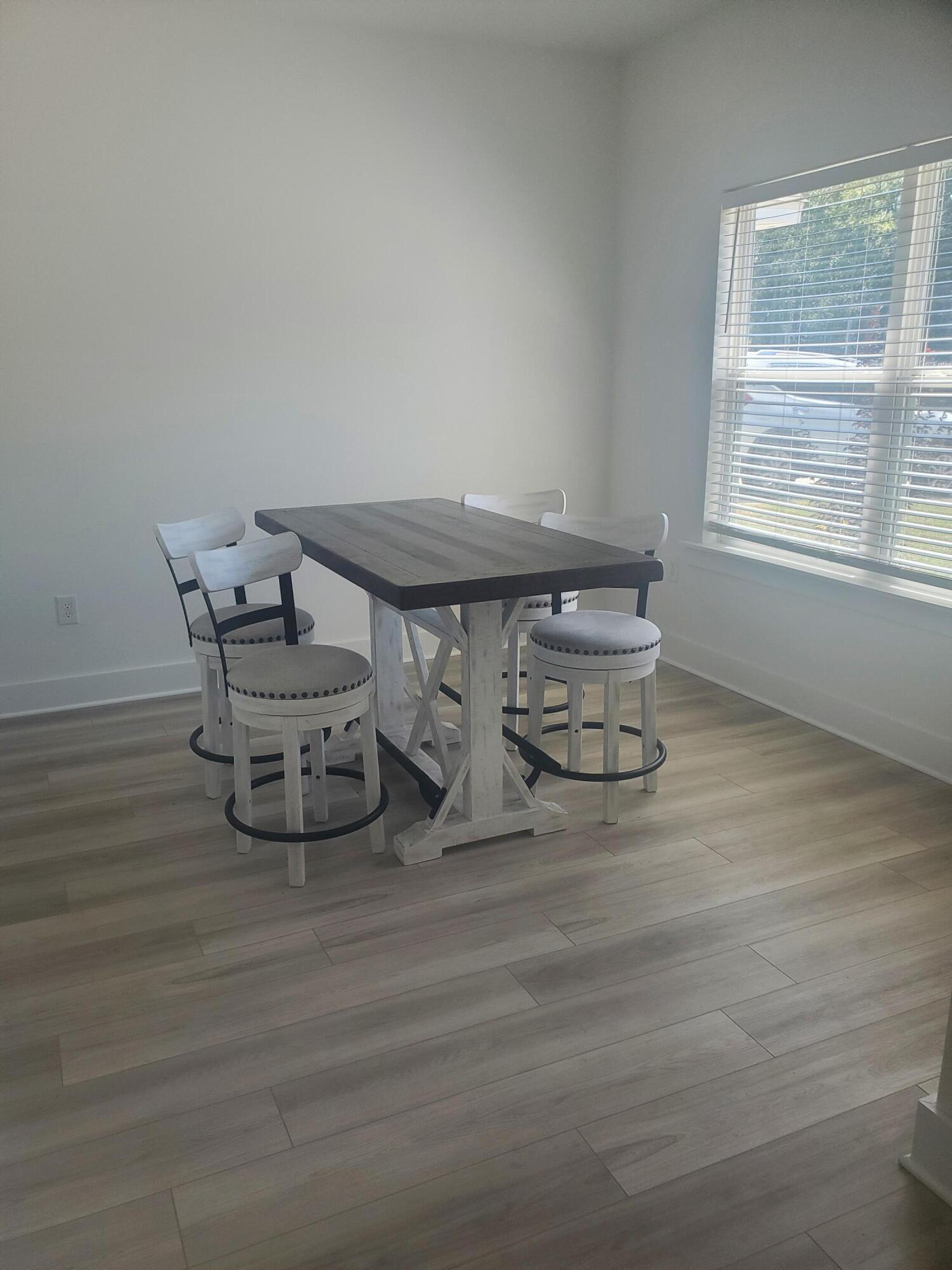 157 Blooming Cove Crestview, FL 32539 - Photo 22 of 37 a dining room with furniture and window