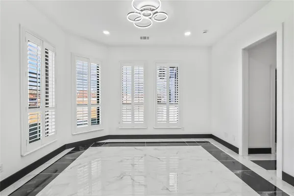 a view of kitchen with cabinets and wooden floor