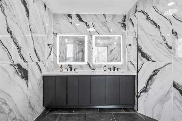 a bathroom with a bathtub sink and toilet