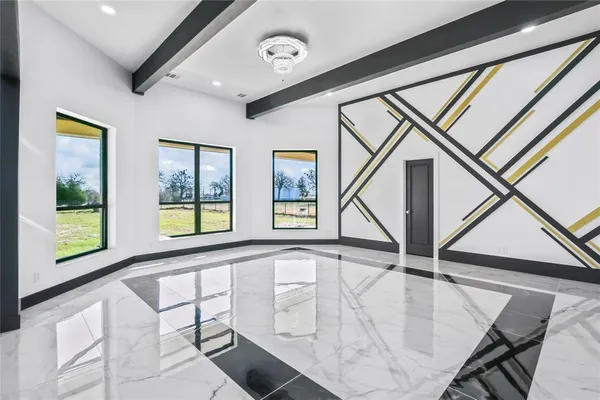 a living room with large windows