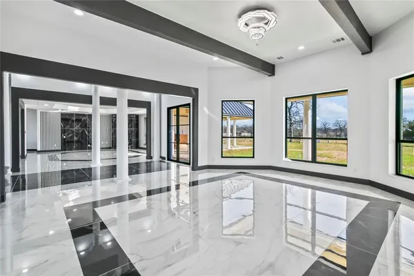 a picture of a living room with a rug