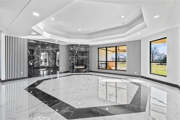 a view of a hall with an entryway