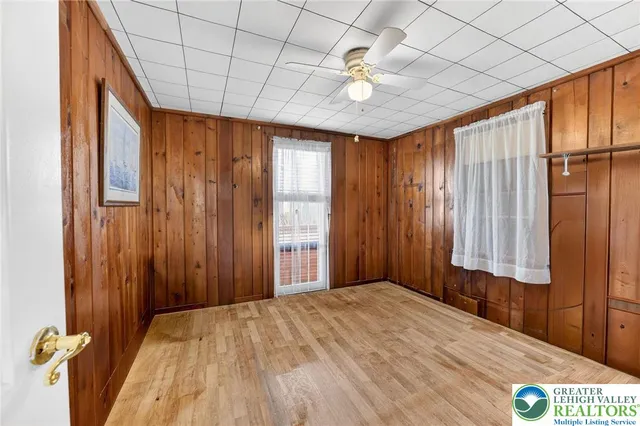 a view of a room with a large window