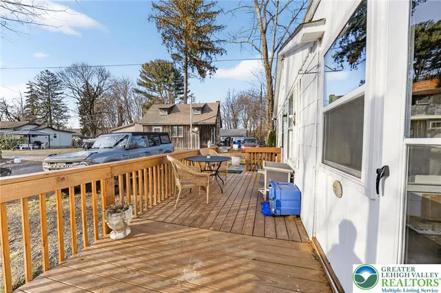 a view of roof deck with patio
