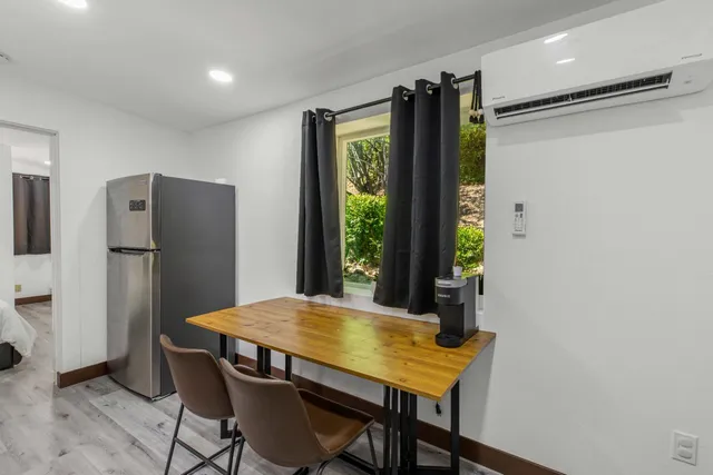 a view of a bathroom from the hallway