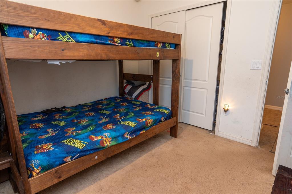 4563 Orchard Grove Road St. Cloud, FL 34772 - Photo 31 of 51 a room with storage and utility