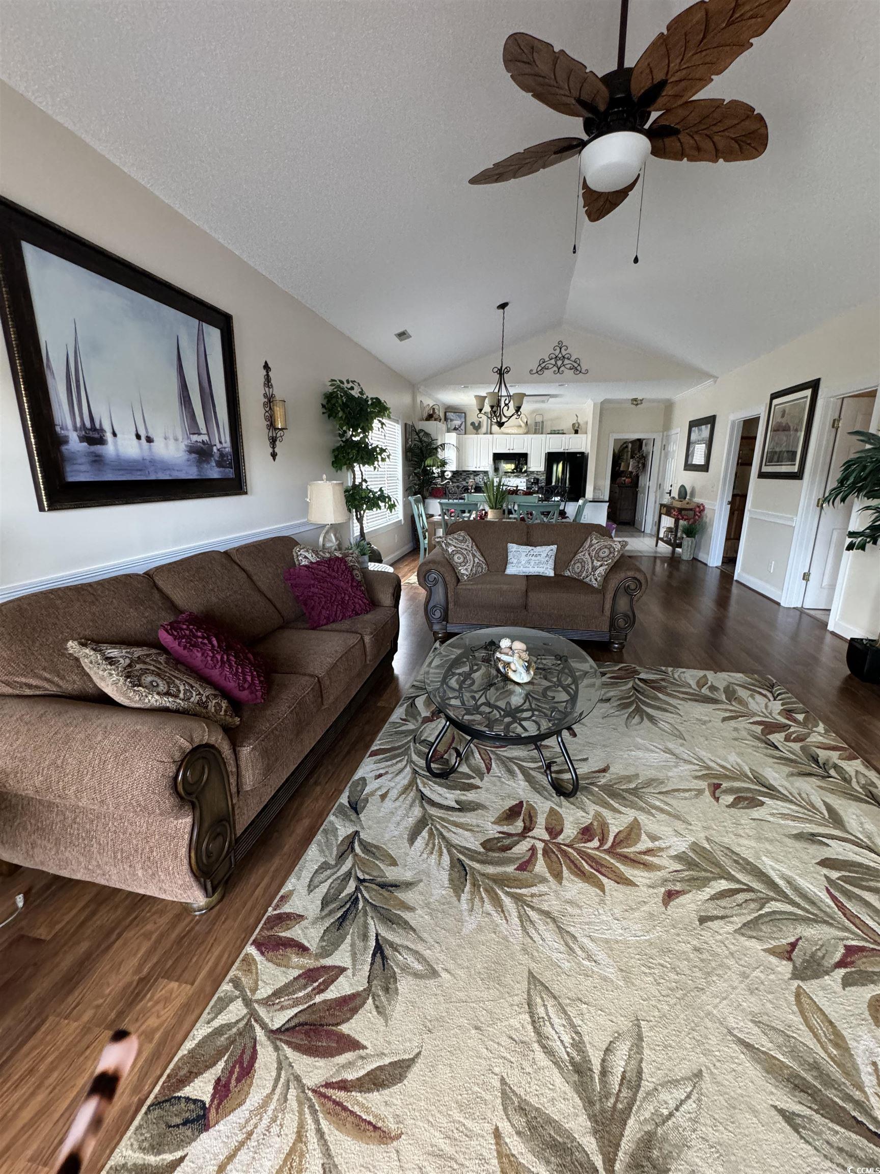 1538 Lanterns Rest Road, Unit 303 Myrtle Beach, SC 29579 - Photo 13 of 23 Living room featuring wood-type flooring, ceiling