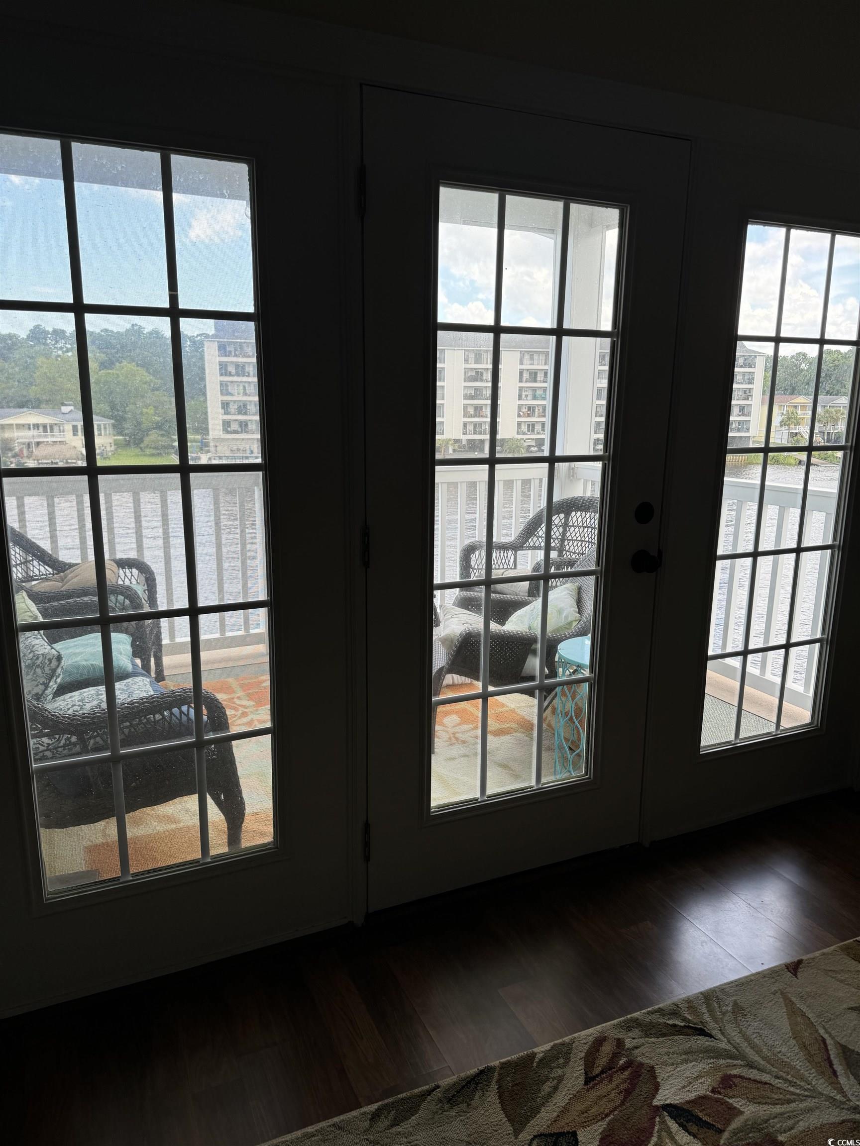 1538 Lanterns Rest Road, Unit 303 Myrtle Beach, SC 29579 - Photo 20 of 23 Doorway featuring plenty of natural light, french
