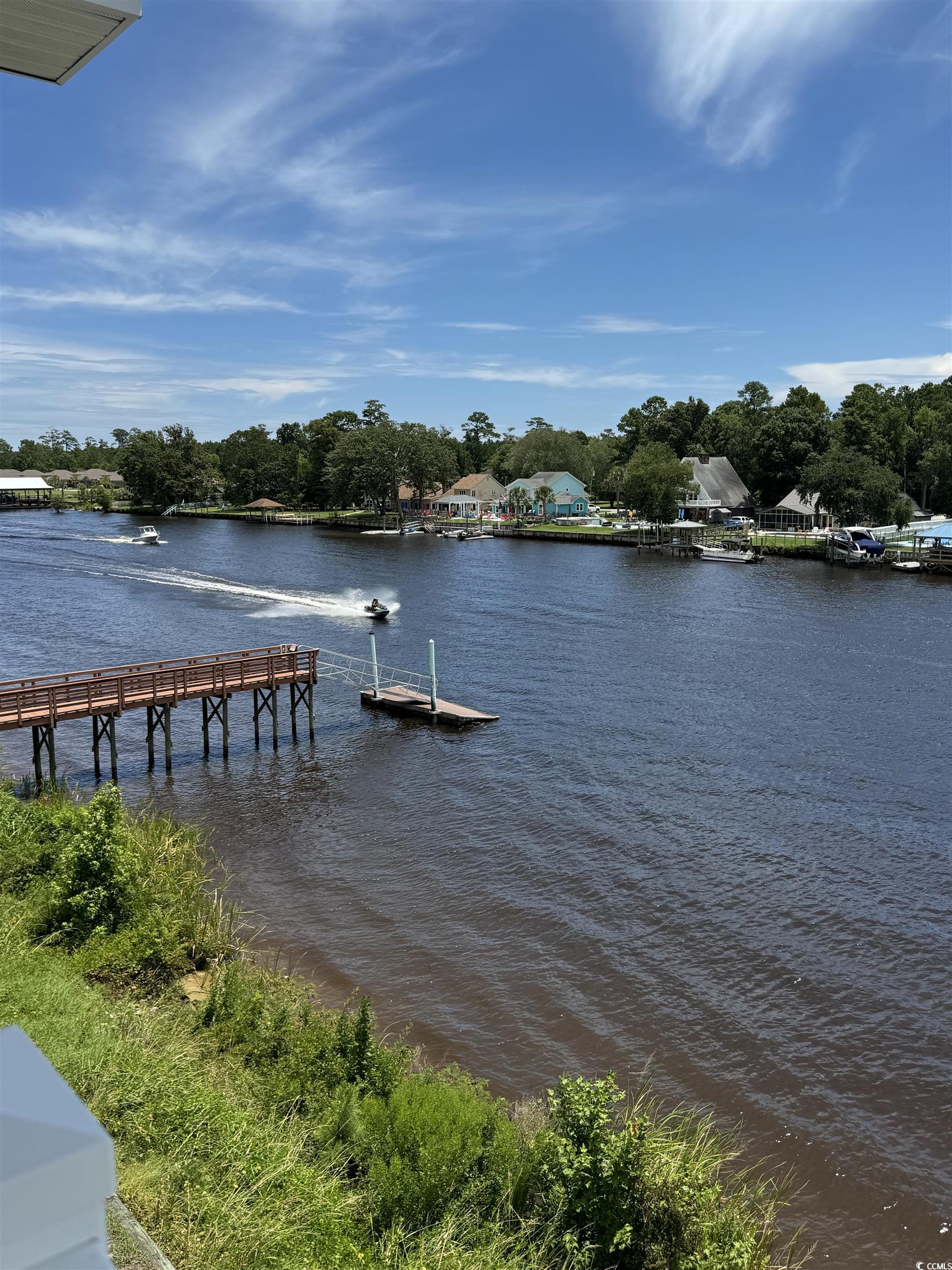 1538 Lanterns Rest Road, Unit 303 Myrtle Beach, SC 29579 - Photo 23 of 23 View of dock featuring a water view