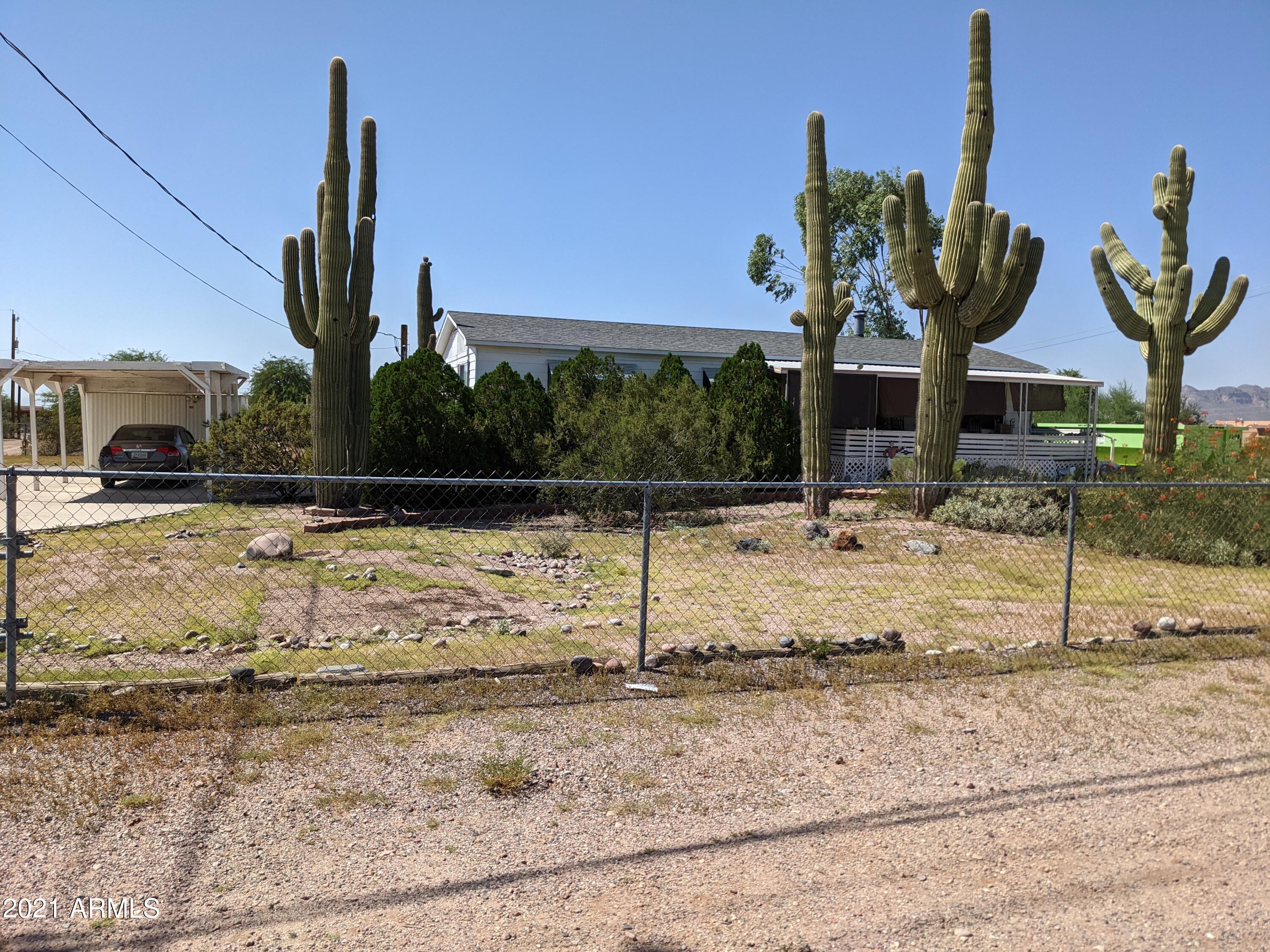 590 North Cactus Road Apache Junction, AZ 85119 - Photo 26 of 34 a view of a backyard of the house