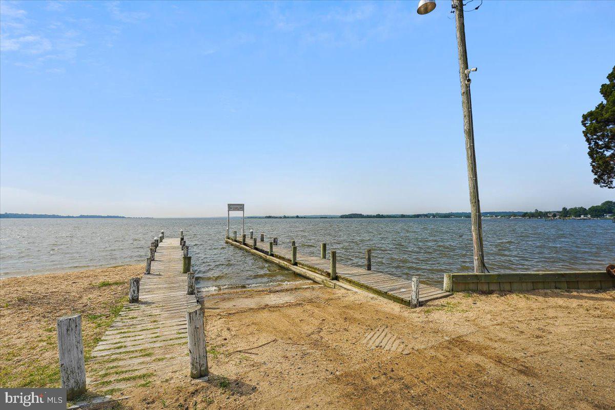 39875 Golden Beach Road Mechanicsville, MD 20659 - Photo 27 of 30 Tranquil lakeside pier at sunset.
