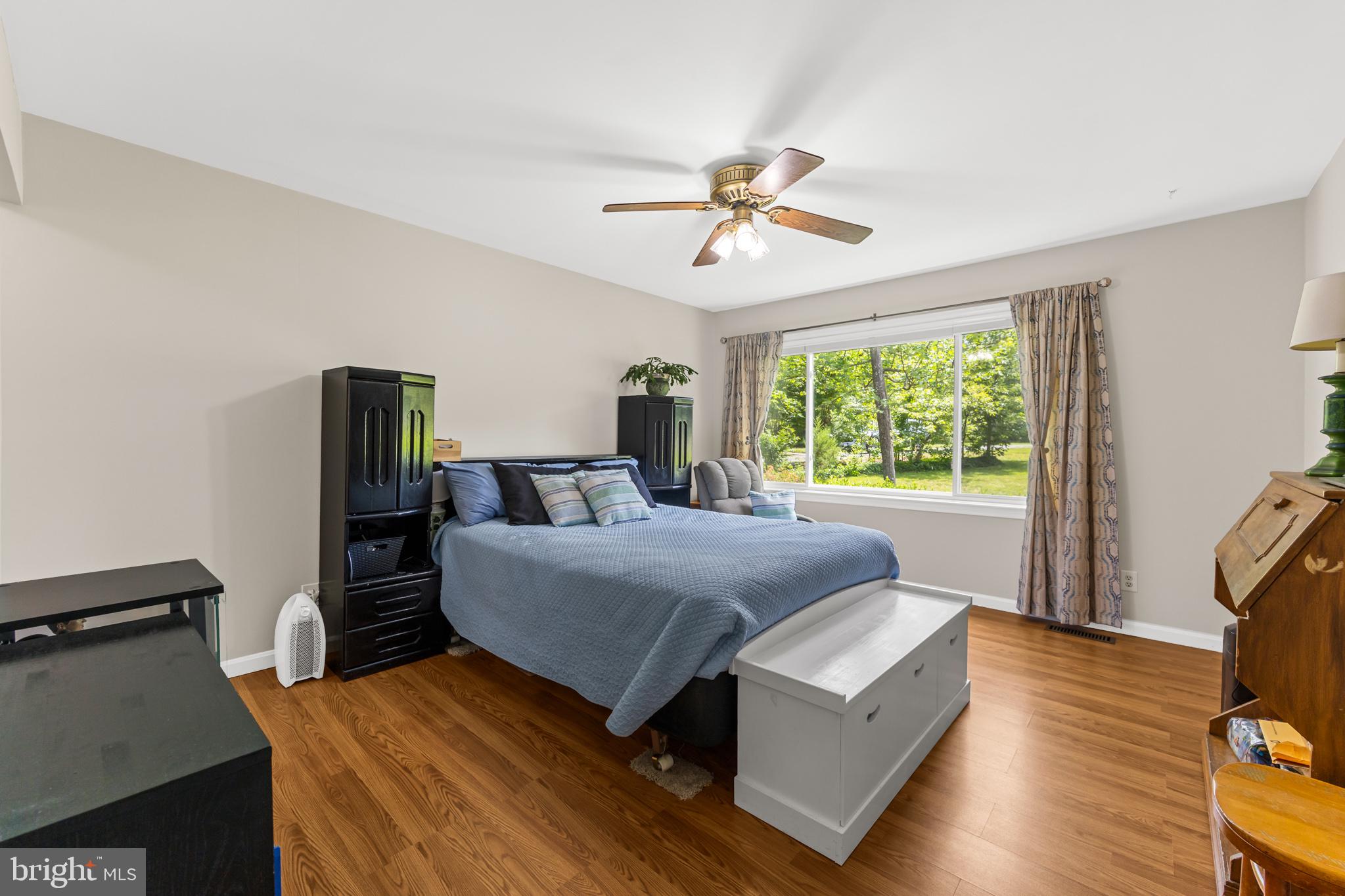 164 Oliver Lane Ruckersville, VA 22968 - Photo 21 of 39 Serene bedroom with nature views.
