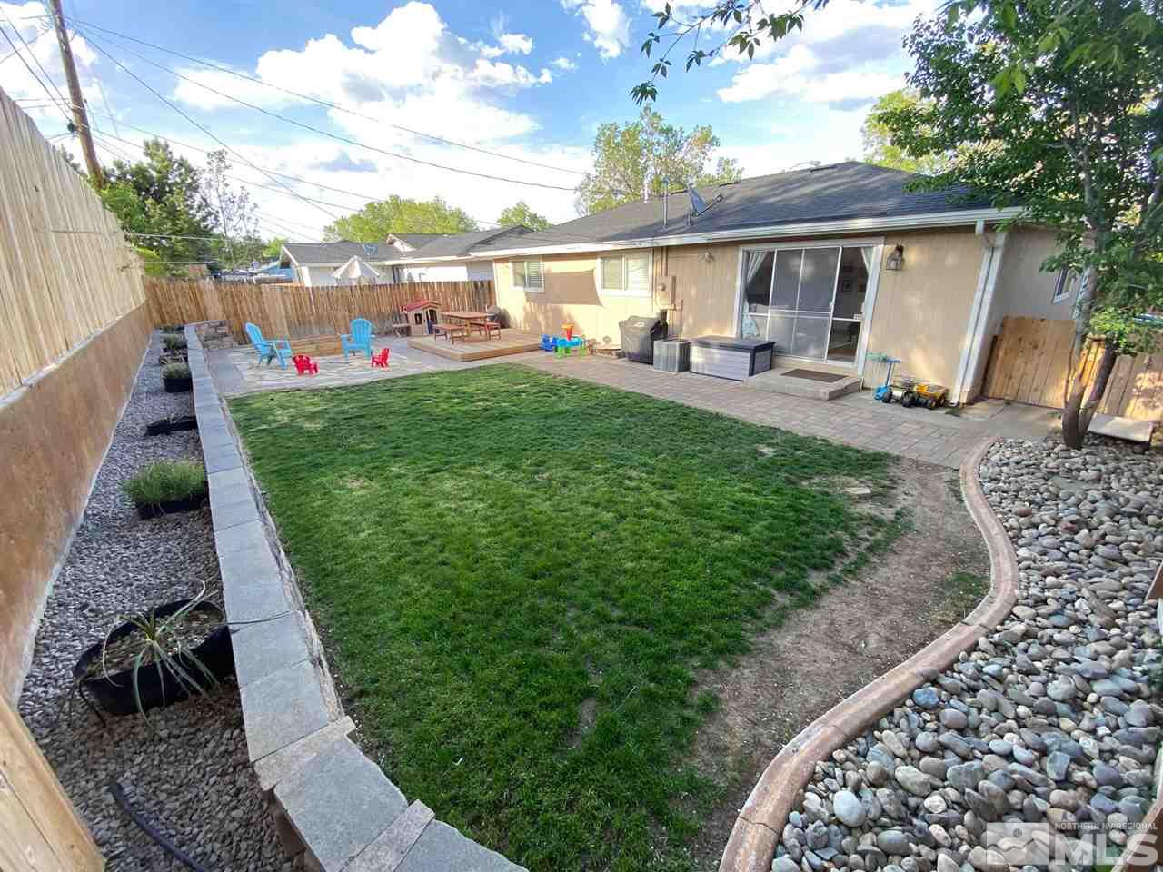 641 Beldon Way Reno, NV 89503 - Photo 19 of 21 a view of a backyard with sitting area