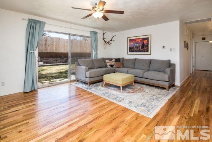 641 Beldon Way Reno, NV 89503 - Photo 3 of 21 a living room with furniture and a large window