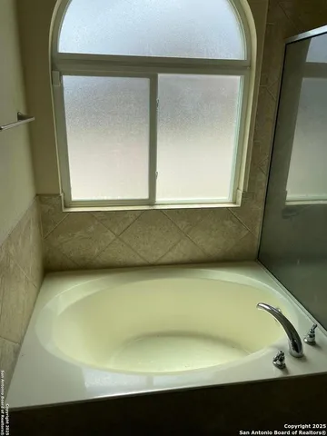 a bathroom with a bathtub