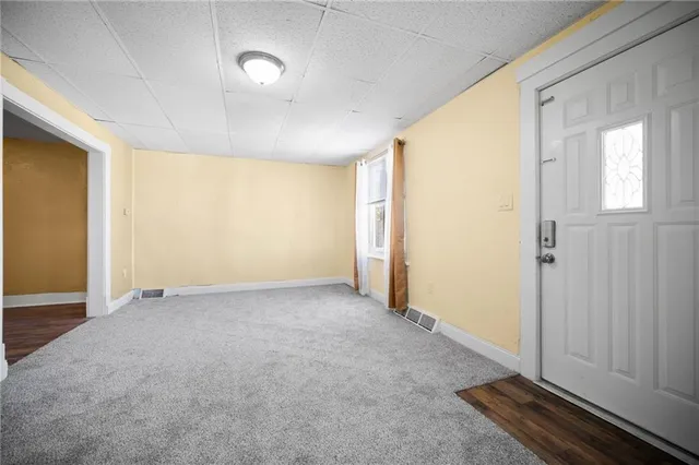 an empty room with windows