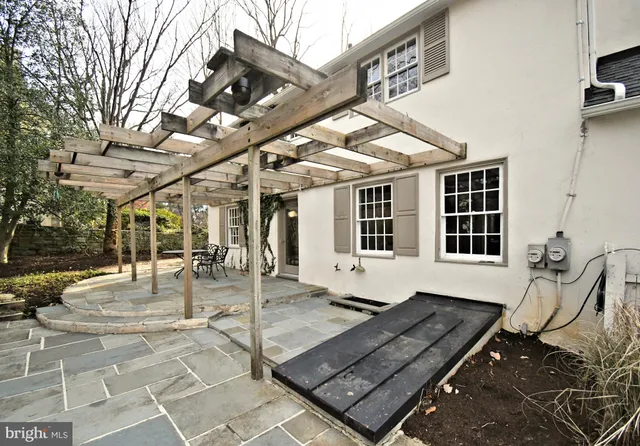 a view of a building with sitting area