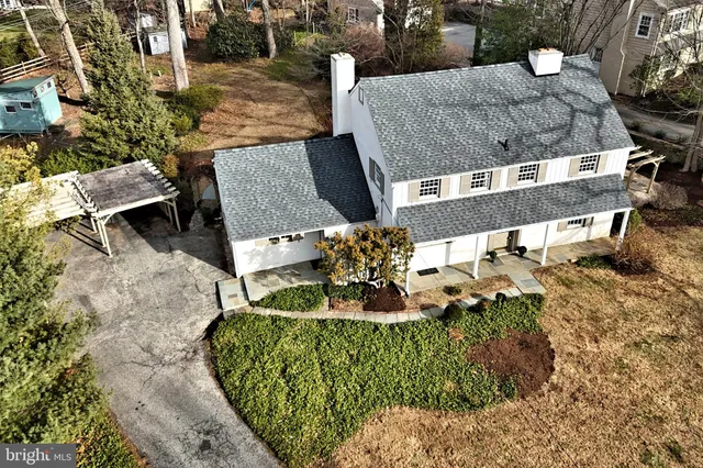 an aerial view of houses with outdoor space