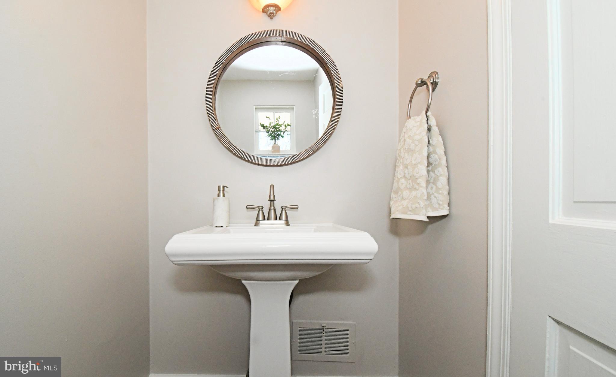 457 School House Lane Devon, PA 19333 - Photo 33 of 93 a bathroom with a sink and a mirror