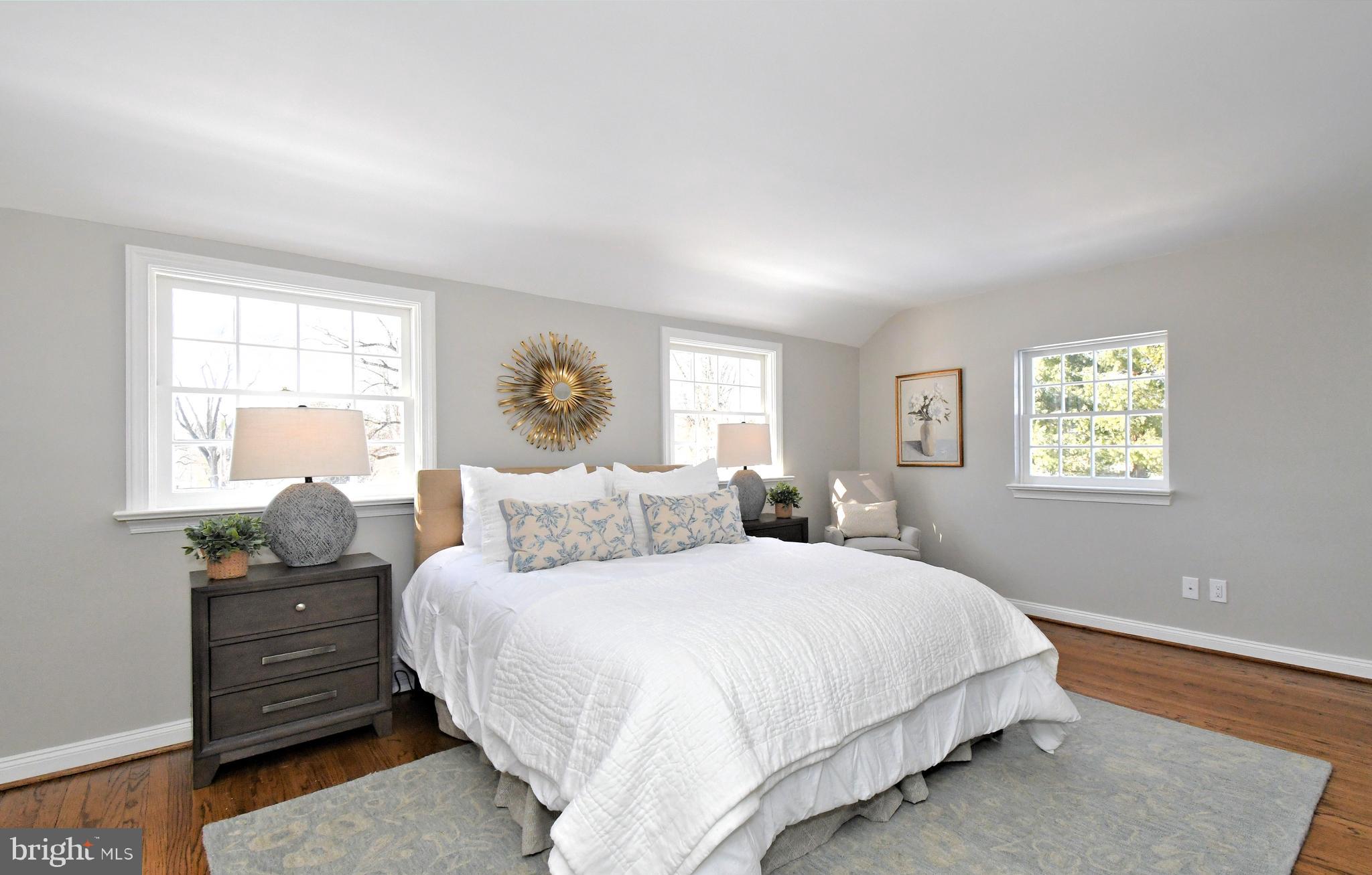 457 School House Lane Devon, PA 19333 - Photo 40 of 93 a bed room with a bed window and a night stand