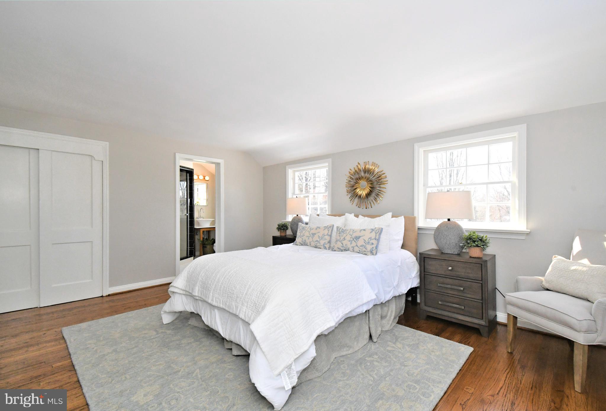 457 School House Lane Devon, PA 19333 - Photo 42 of 93 a bedroom with a bed and wooden floor