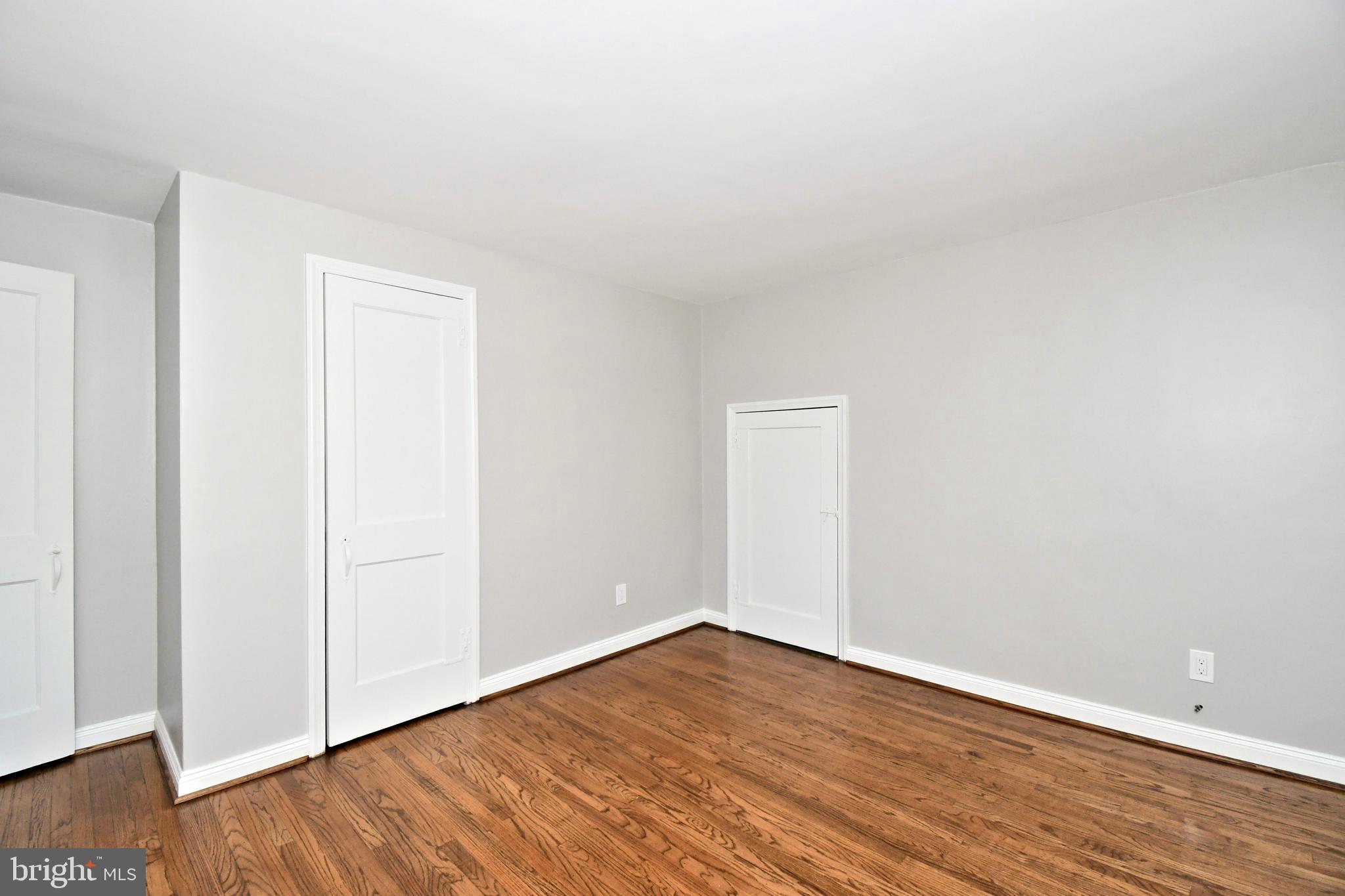 457 School House Lane Devon, PA 19333 - Photo 47 of 93 a view of an empty room with wooden floor